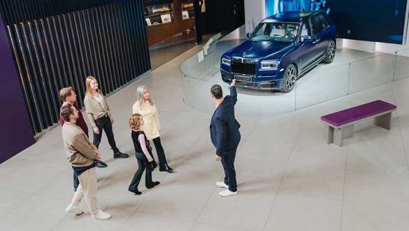Group is guided through the Rolls Royce exhibition at BMW Welt