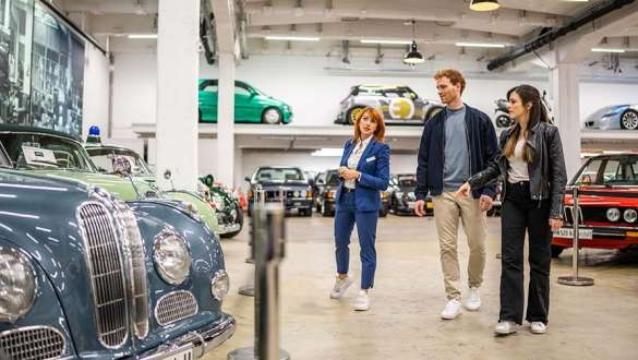 Couple is guided through the BMW Group Classic exhibition