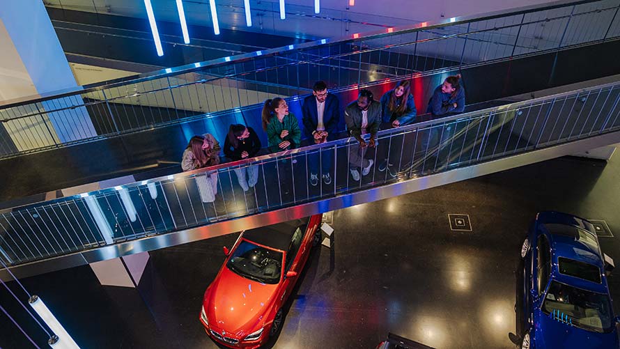 Guided Tour Group in front of BMW Isetta at BMW Museum