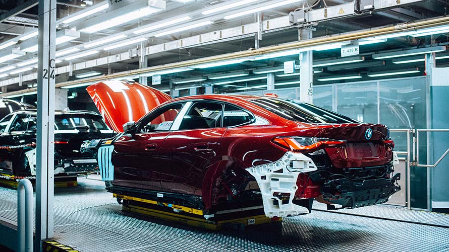 Body of a red BMW on a treadmill