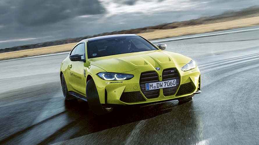 Yellow BMW M on the test track.