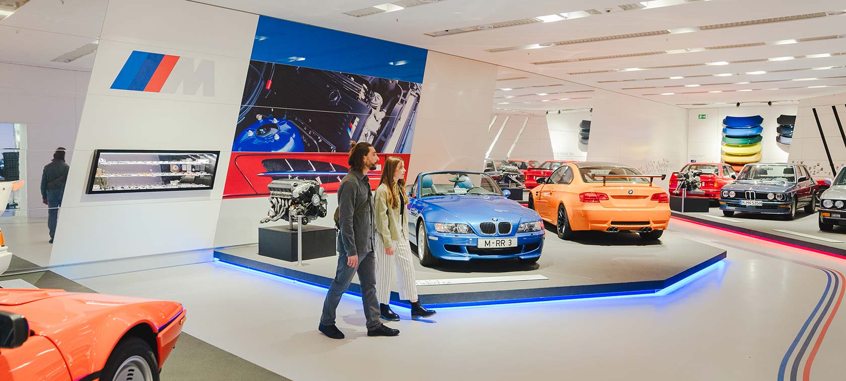 Visitors to the BMW Museum tour the BMW M Classic exhibition