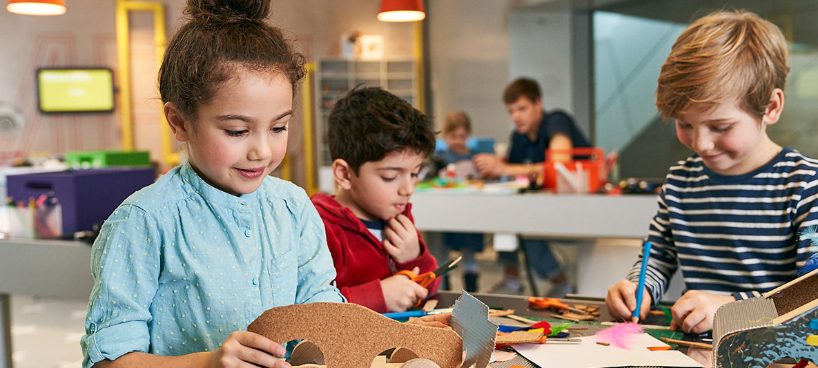 BMW Welt Creative workshop Children make wooden cars at the BMW Welt creative workshop